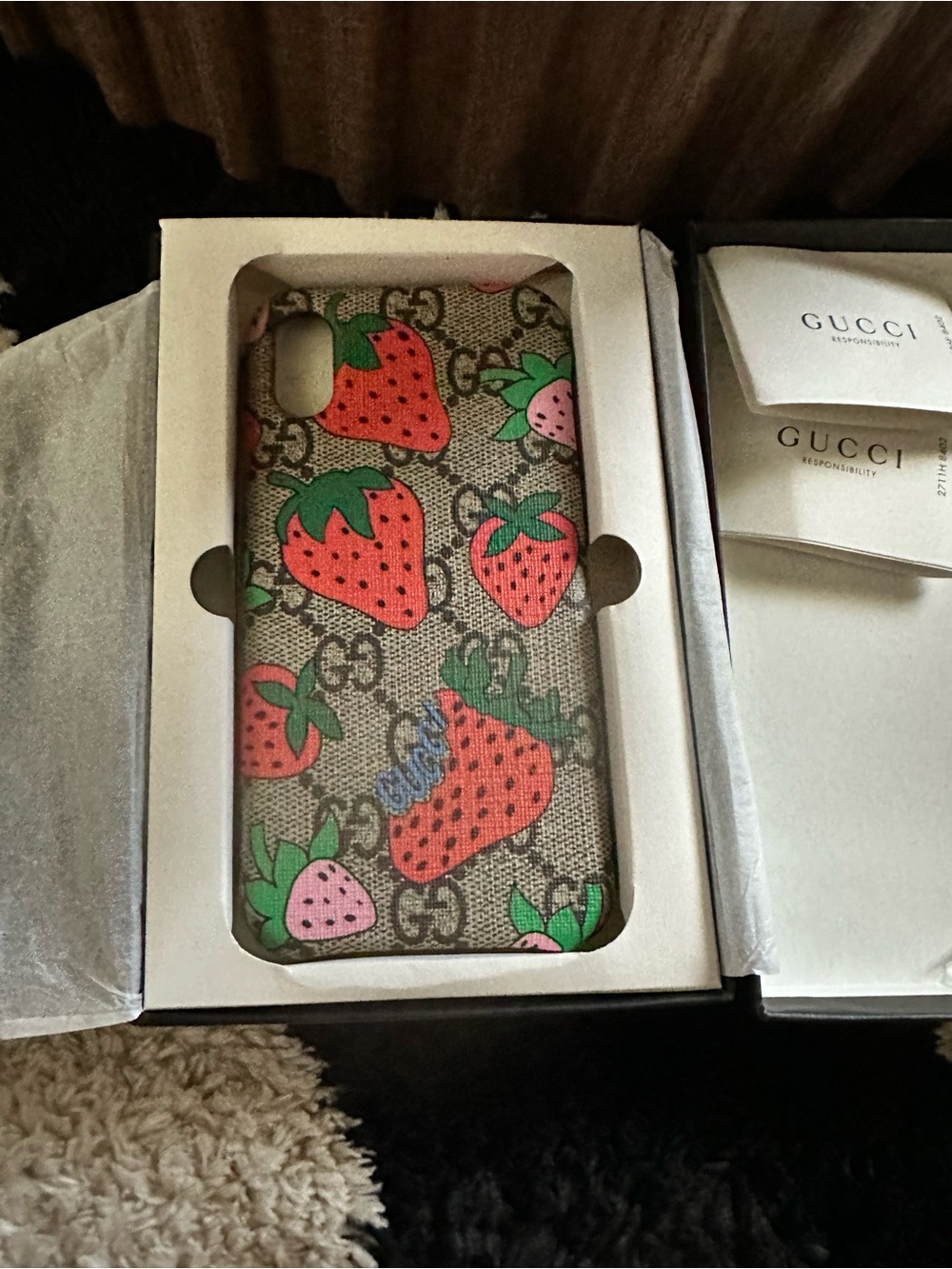 Gucci GG Supreme Strawberry iPhone X/XS case.